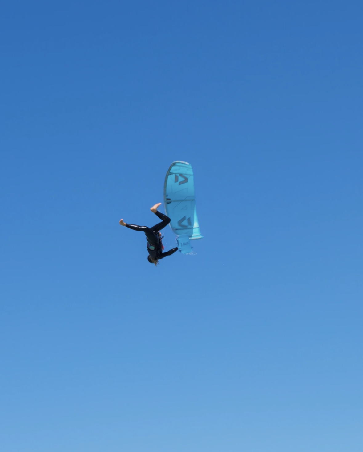 Ben Kiter mid-air during a kitesurfing session
